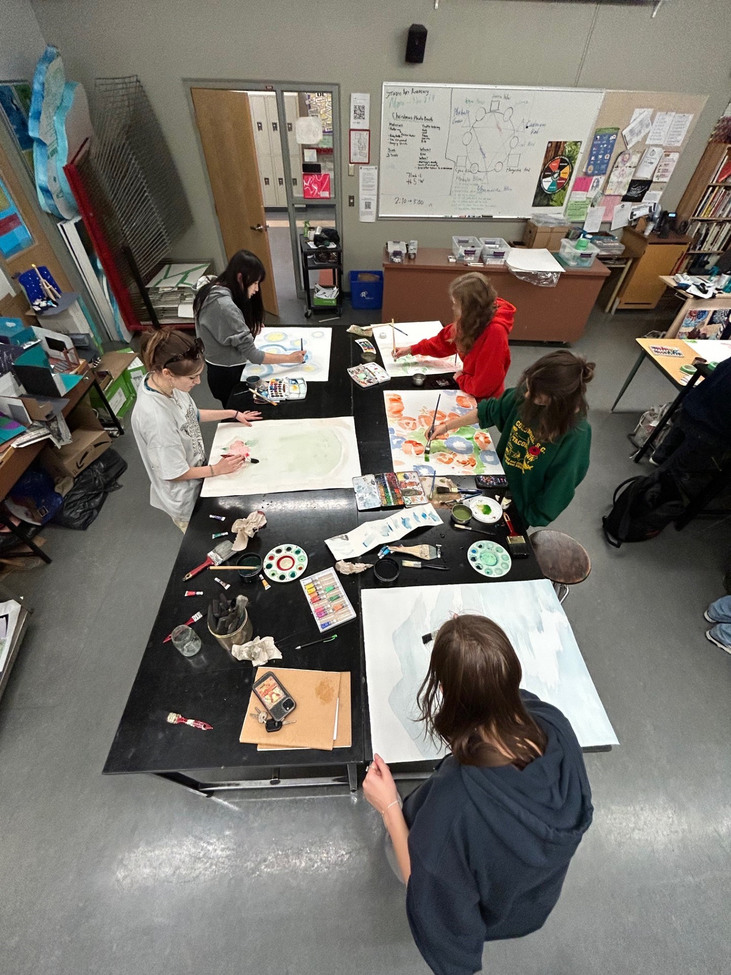 Students making art in a classroom